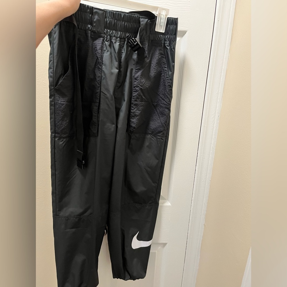 Nike wind track pants with buckle